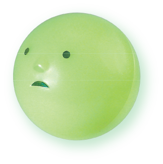 SMISKI Strap Accessory capsule. SMISKI product found inside. Glow in the dark plastic capsule is shaped like SMISKI's head, with SMISKI's distinct facial features