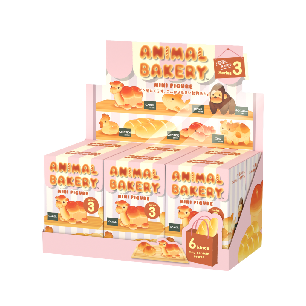 Display of Animal Bakery mini figure boxes with animal illustrations on a white background