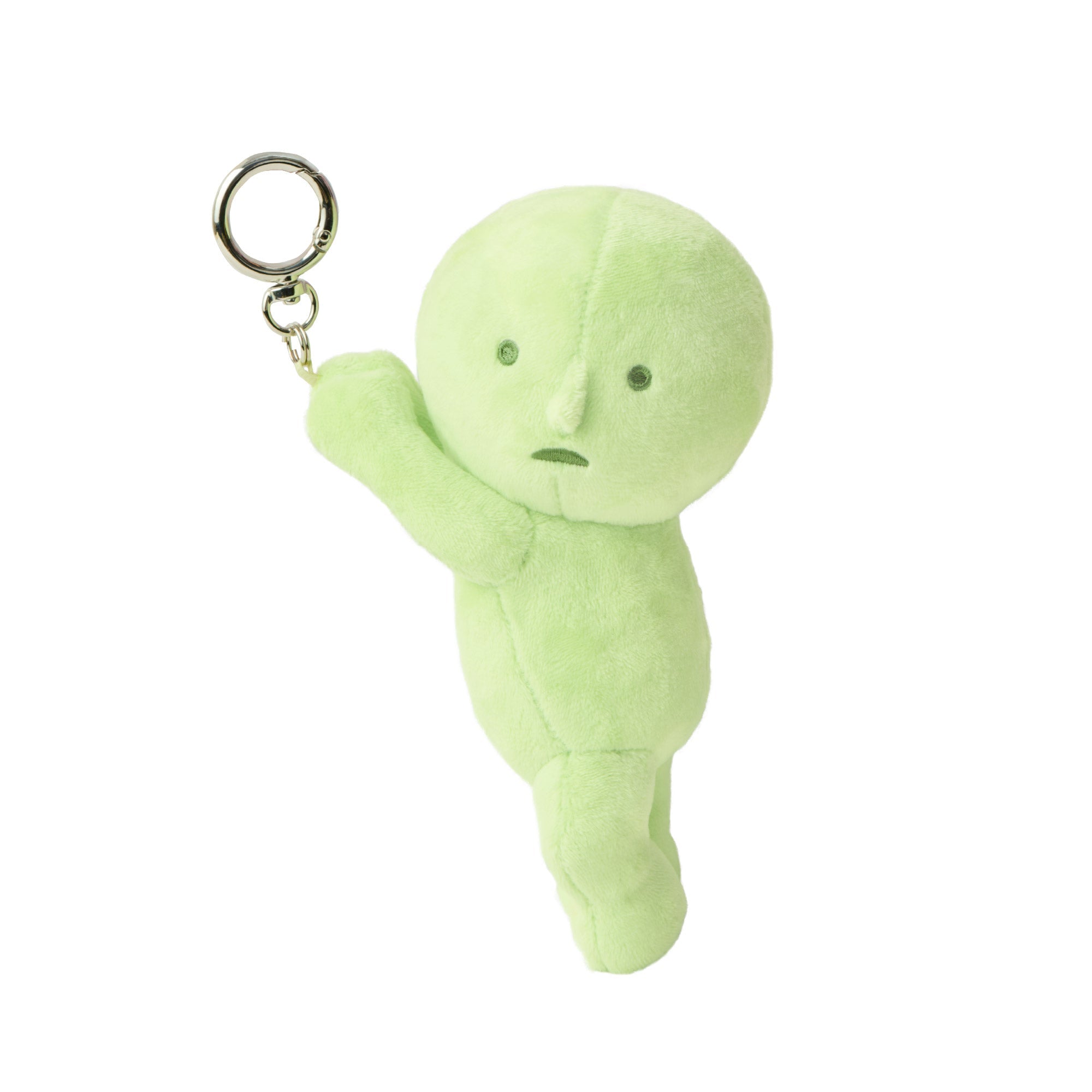 Image shows green plush SMISKI figure  with embroidery eyes and mouth appearing to be falling, holding a silver loop and keychain clip.