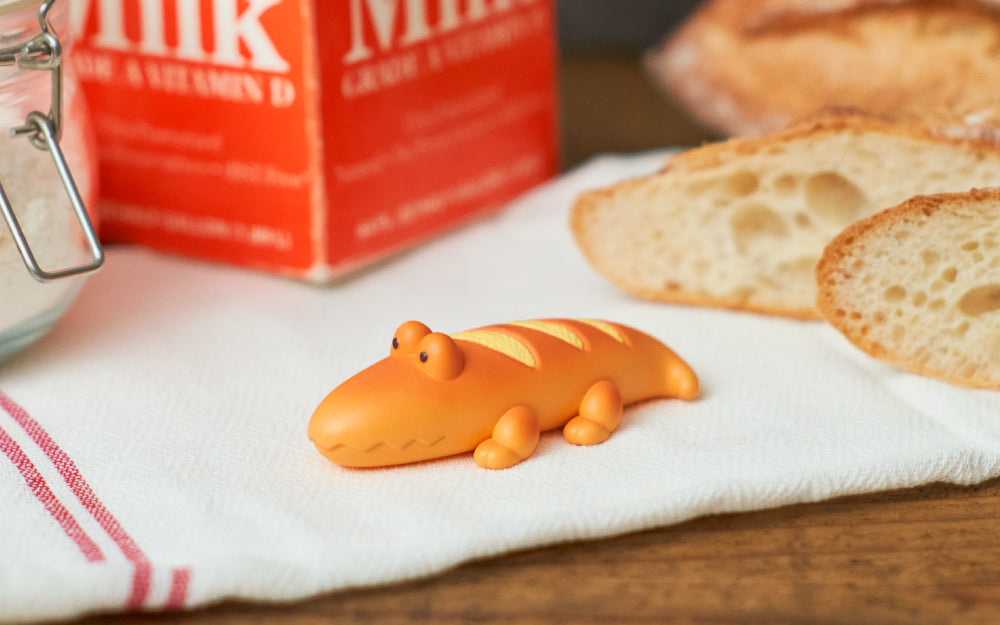 a closeup image of the baguette crocodile animal bakery minifigure