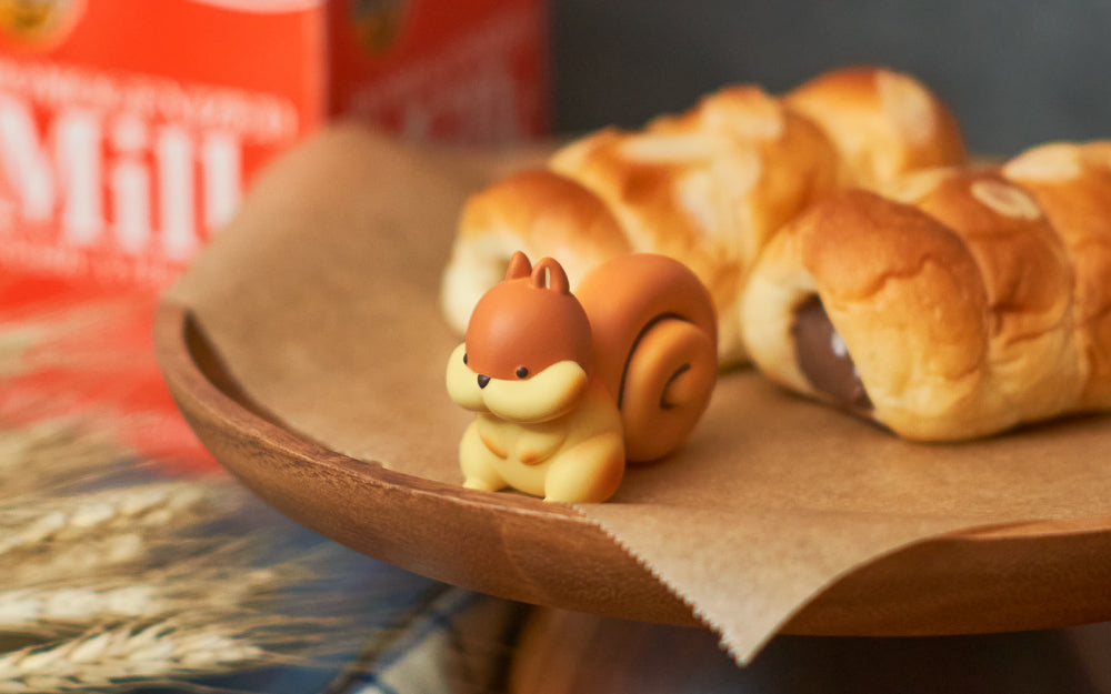 a closeup image of the cinnamon roll squirrel animal bakery minifigure