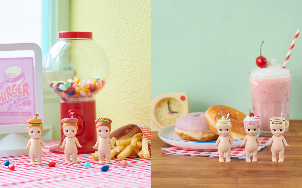 sonny angel snack series banner image featuring two lifestyle images spliced together. left: sonny angel minifigures; sandwich, donut and hotdog figures standing in front of a jellybean dispenser, fries and a BEST BURGER IN TOWN advertisement on a checkered tablecloth. right: sonny angel minifigures; sugar bowl, milkshake and coffee cup standing in front of a pink milkshake, plate of donuts and kitchen timer on a wooden table. 