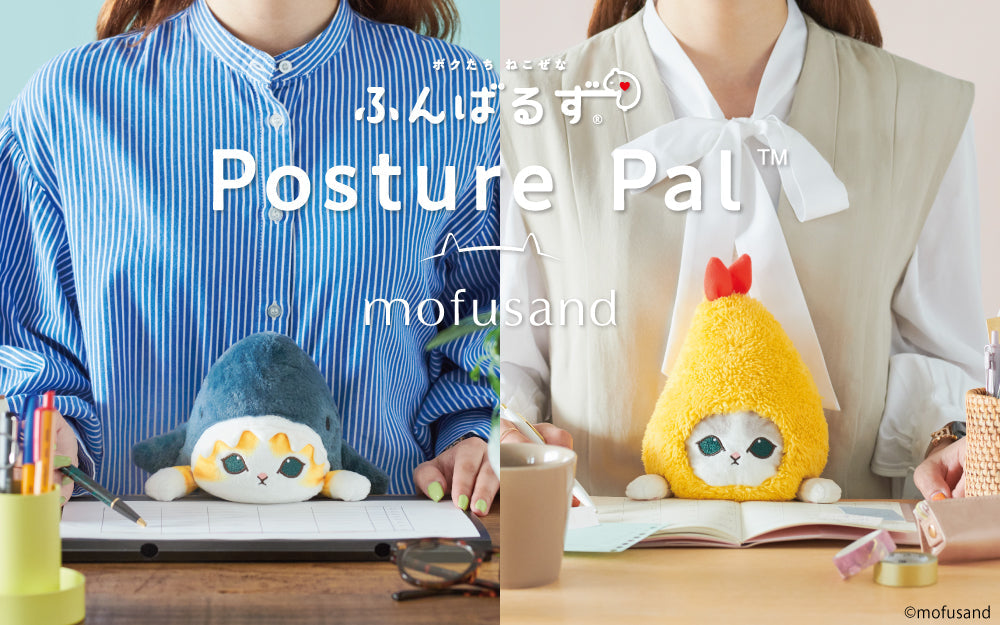mofusand Posture Pal split image shows left: Shark Meow Posture Pal sat at a desktop in the lap of a figure with a blue striped shirt. Right side: set in the lap of a figure in a white shirt and tan vest, Shrimp Meow Posture Pal looks at the camera atop an open notebook