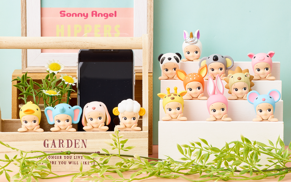 lineup image of sonny angel original animal hippers minifigure series with text SONNY ANGEL HIPPERS. full lineup includes duck elephant lop eared rabbit sheep panda koala pig fawn lion giraffe rabbit mouse and unicorn (secret)